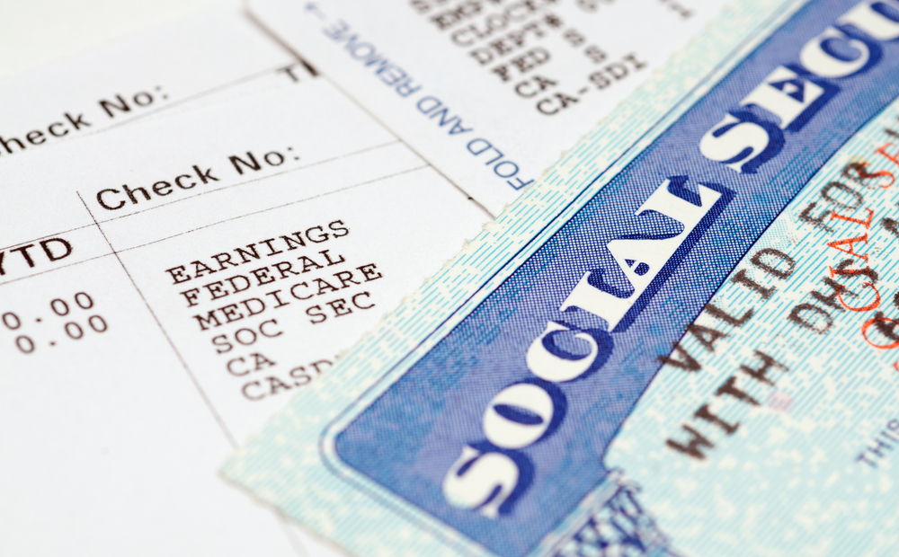 a break down of bills and a social security card
