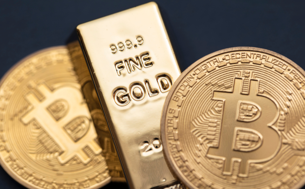gold bar and bitcoin token